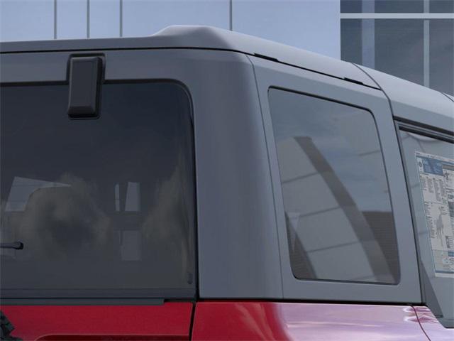 Photo of 2025 RUBY RED MET TNTD CLEARCOAT Ford Bronco