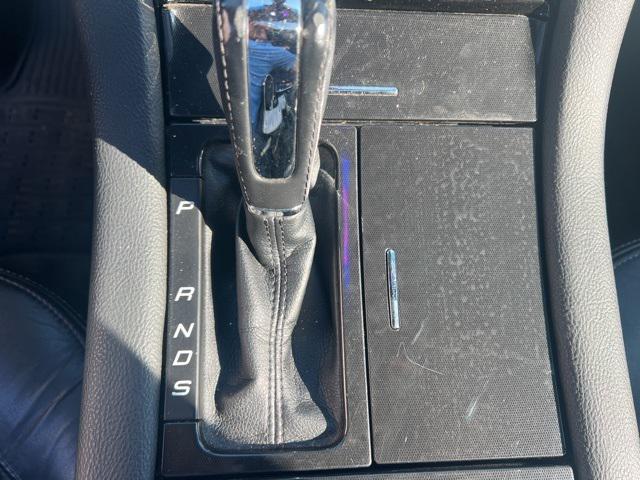 Photo of 2015 Tuxedo Black Ford Taurus