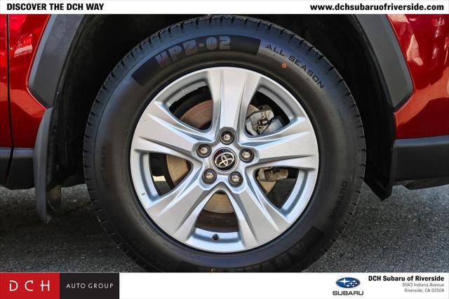 Photo of 2021 Ruby Flare Pearl Toyota RAV4 Hybrid