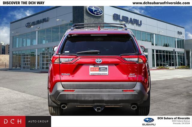 Photo of 2021 Ruby Flare Pearl Toyota RAV4 Hybrid
