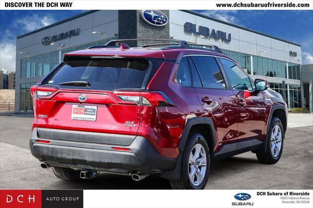 Photo of 2021 Ruby Flare Pearl Toyota RAV4 Hybrid