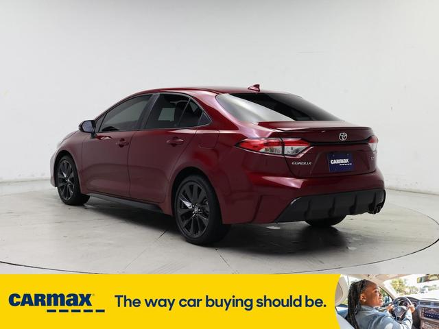 Photo of 2023 Burgundy Toyota Corolla