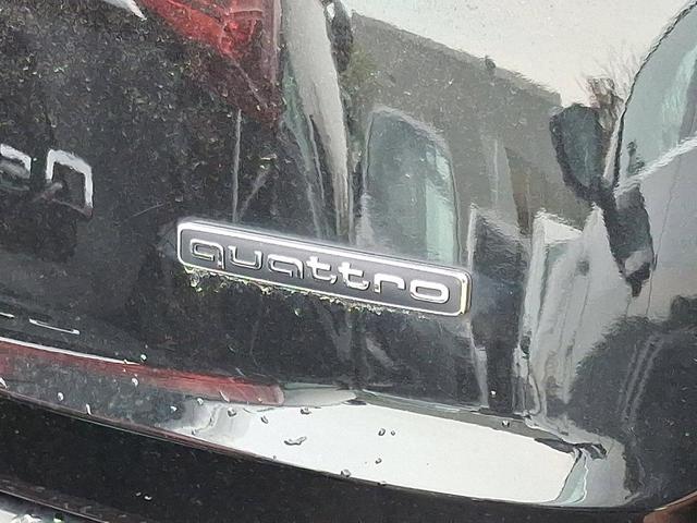 Photo of 2023 Mythos Black Metallic Audi Q7