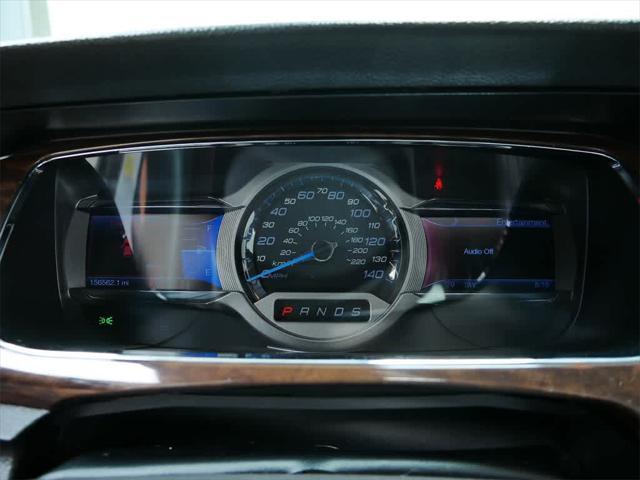 Photo of 2013 Ingot Silver Metallic Ford Taurus