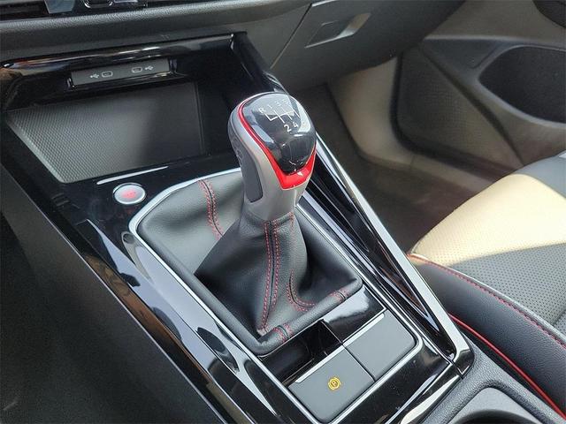 Photo of 2024 Opal White W / Black Roof Volkswagen Golf GTI