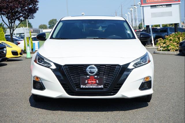 Photo of 2022 Pearl White Tricoat Nissan Altima