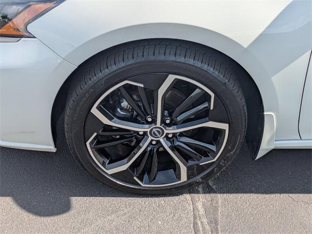 Photo of 2025 Pearl White Tricoat Nissan Altima
