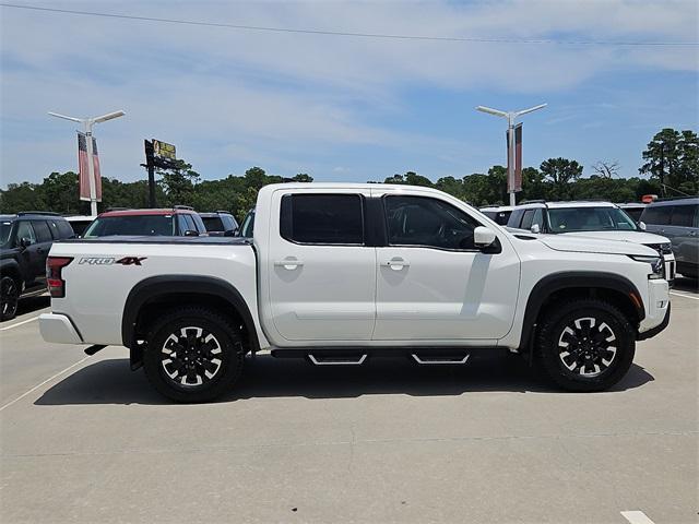 Photo of 2023 Glacier White Nissan Frontier