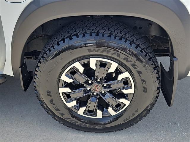 Photo of 2023 Glacier White Nissan Frontier