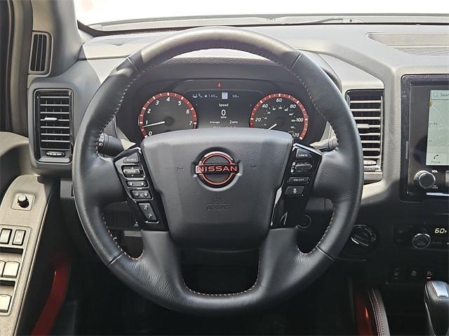 Photo of 2023 Glacier White Nissan Frontier