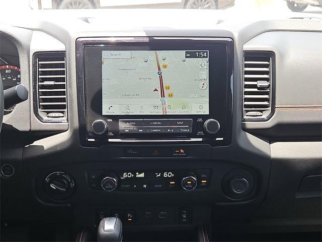 Photo of 2023 Glacier White Nissan Frontier