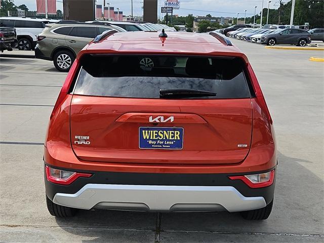 Photo of 2023 Fire Orange Kia Niro