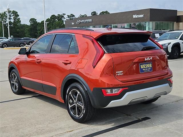 Photo of 2023 Fire Orange Kia Niro