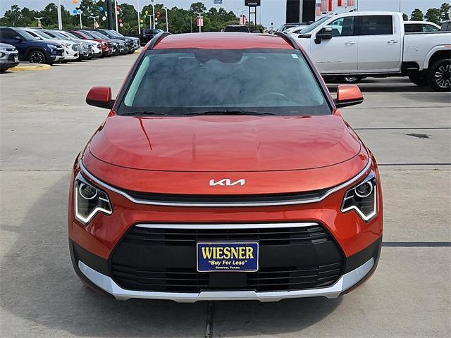 Photo of 2023 Fire Orange Kia Niro