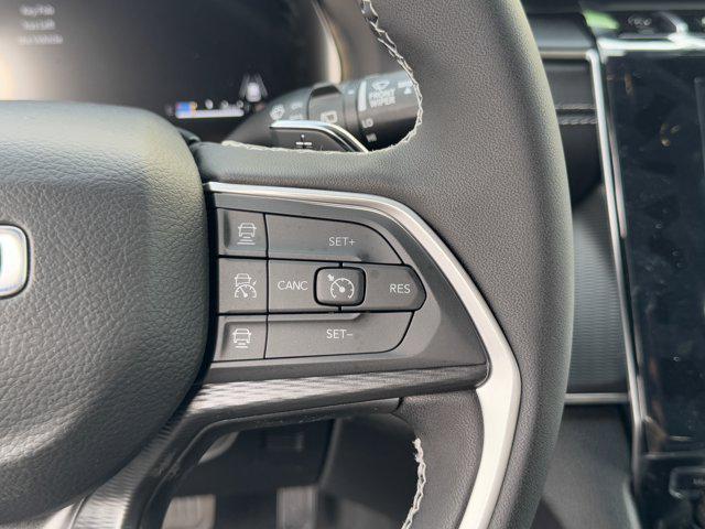 Photo of 2025 Bright White Clearcoat Jeep Grand Cherokee