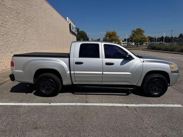 Photo of 2008 Sierra Silver Metallic Mitsubishi Raider