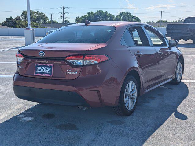 Photo of 2023 Ruby Flare Pearl Toyota Corolla Hybrid