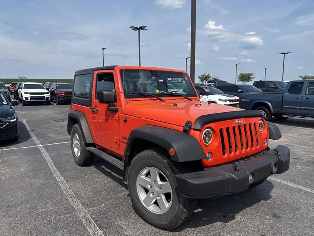 Photo of 2015 Sunset Orange Pearlcoat Jeep Wrangler