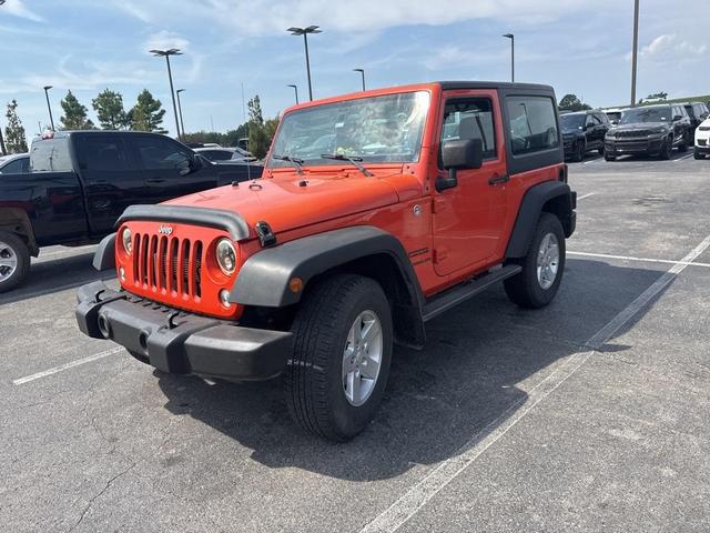 Photo of 2015 Sunset Orange Pearlcoat Jeep Wrangler