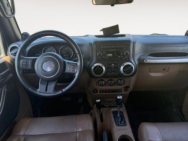 Photo of 2012 Black Clearcoat Jeep Wrangler Unlimited