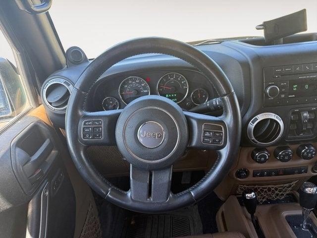 Photo of 2012 Black Clearcoat Jeep Wrangler Unlimited