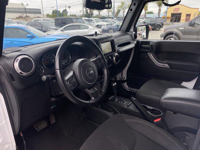 Photo of 2018 Bright White Clearcoat Jeep Wrangler JK Unlimited