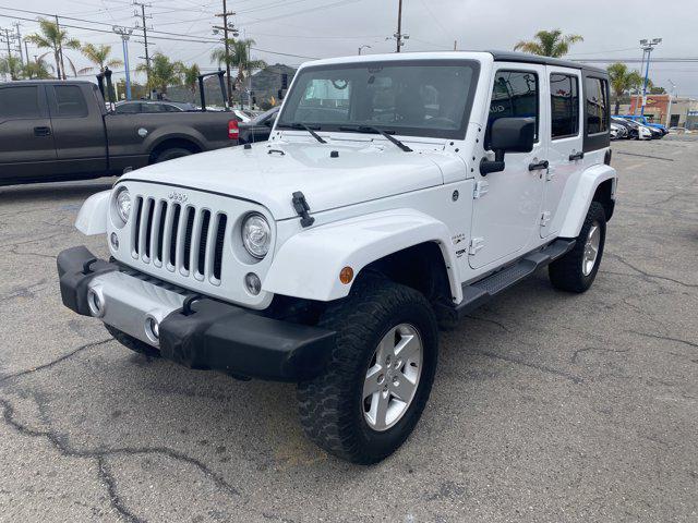 Photo of 2018 Bright White Clearcoat Jeep Wrangler JK Unlimited