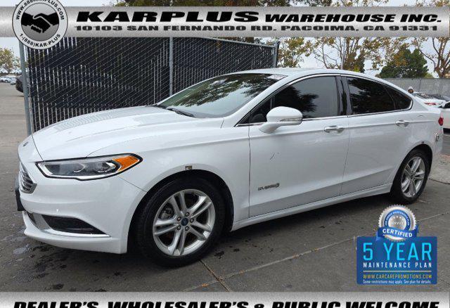 Photo of 2018 White Ford Fusion Hybrid