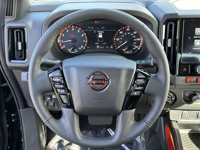 Photo of 2025 Super Black Nissan Frontier