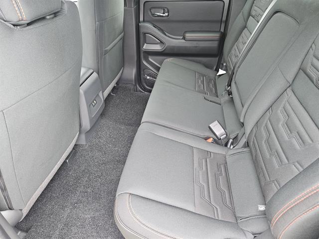 Photo of 2025 Glacier White Nissan Frontier
