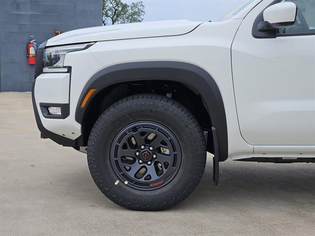Photo of 2025 Glacier White Nissan Frontier