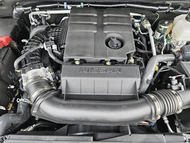 Photo of 2025 Glacier White Nissan Frontier