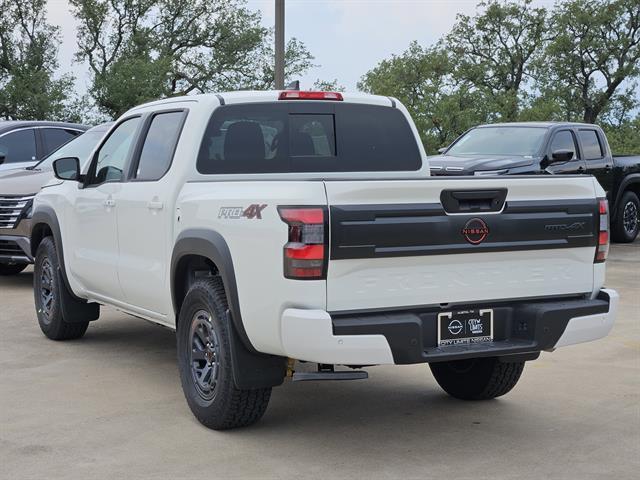Photo of 2025 Glacier White Nissan Frontier