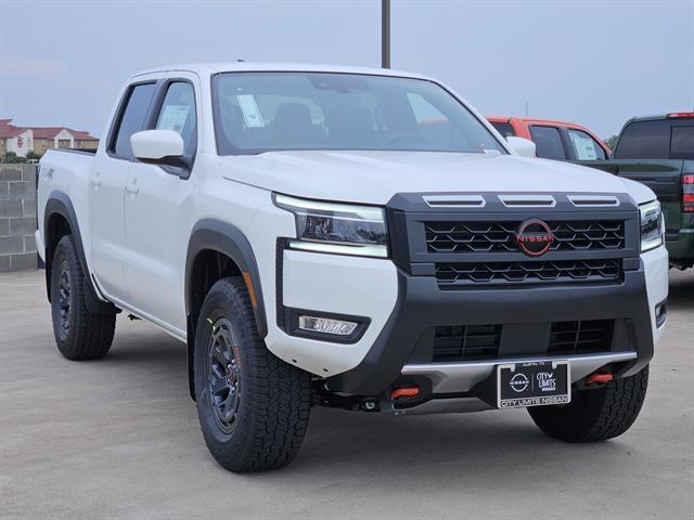 Photo of 2025 Glacier White Nissan Frontier