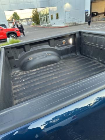 Photo of 2022 Patriot Blue Pearlcoat RAM 1500