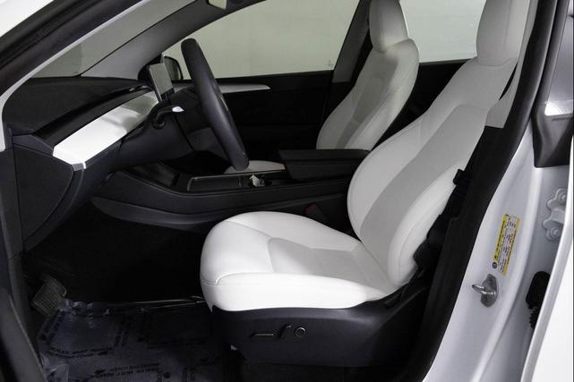 Photo of 2024 Pearl White Multi-Coat Tesla Model Y