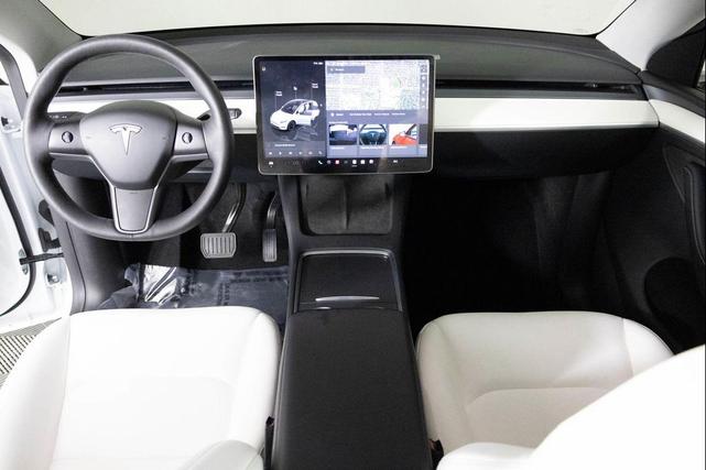 Photo of 2024 Pearl White Multi-Coat Tesla Model Y