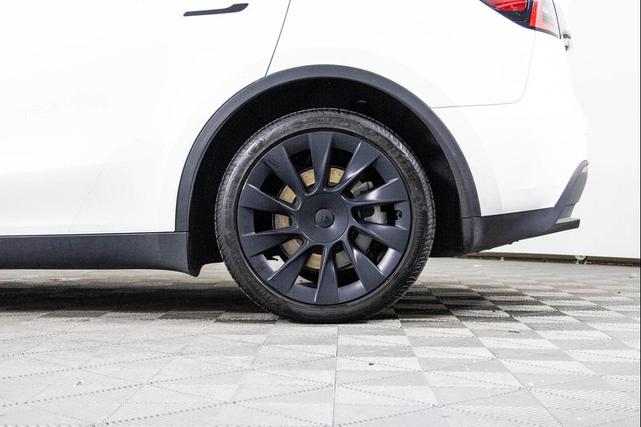 Photo of 2024 Pearl White Multi-Coat Tesla Model Y