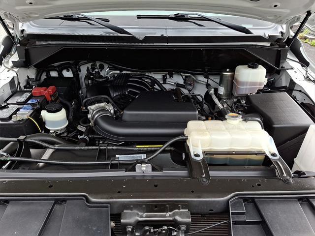Photo of 2021 Pearl White Nissan NV Passenger NV3500 HD