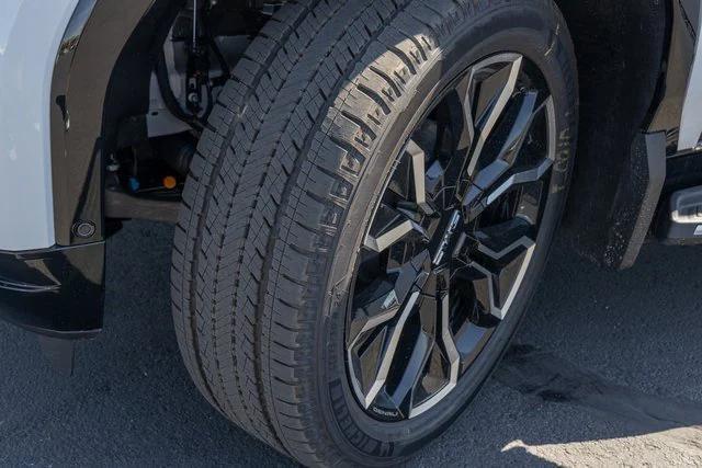 Photo of 2025 Summit White GMC Sierra EV