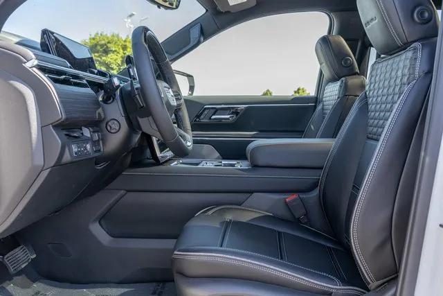 Photo of 2025 Summit White GMC Sierra EV