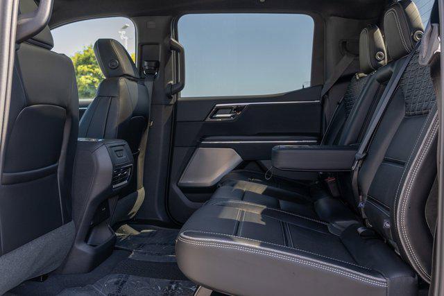 Photo of 2025 Summit White GMC Sierra EV