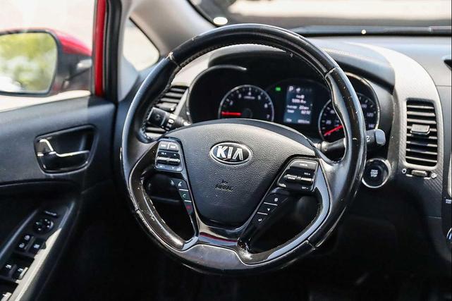 Photo of 2017 Currant Red Kia Forte