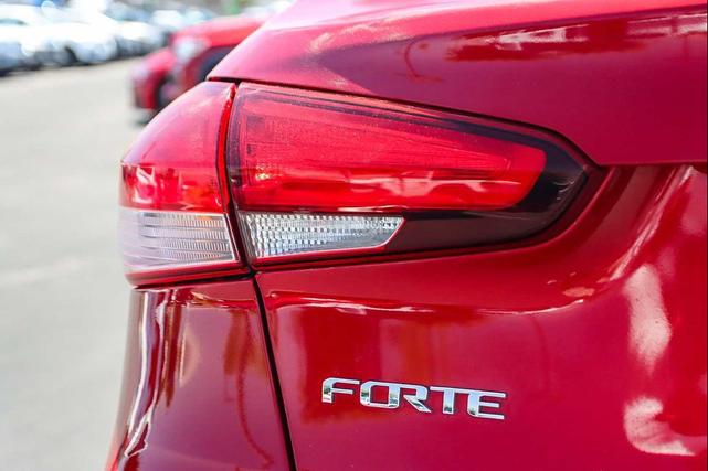 Photo of 2017 Currant Red Kia Forte