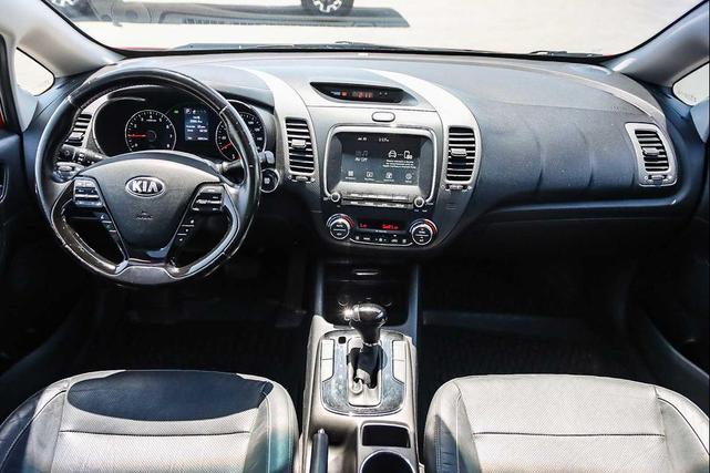 Photo of 2017 Currant Red Kia Forte