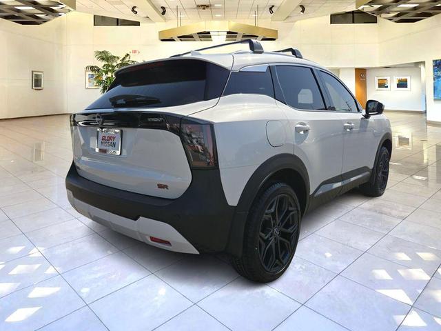 Photo of 2025 Aspen White Tricoat Nissan Kicks