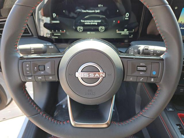 Photo of 2025 Aspen White Tricoat Nissan Kicks