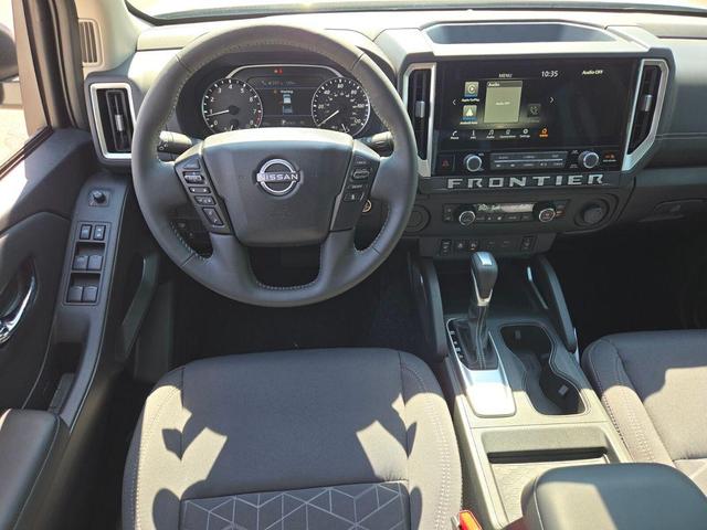 Photo of 2025 Glacier White Nissan Frontier
