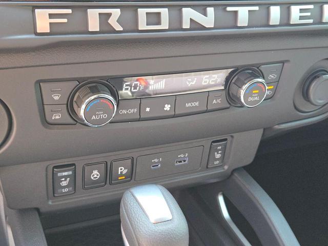 Photo of 2025 Glacier White Nissan Frontier
