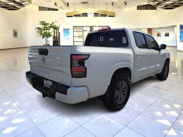 Photo of 2025 Glacier White Nissan Frontier